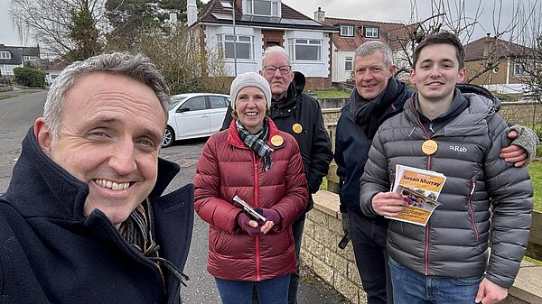 Alex Cole-Hamilton, Susan Murray and Willie Rennie out with Lib Dem Campaigners holding canvass cards