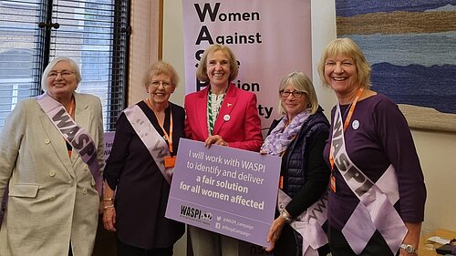 Susan Murray standing with a group of WASPI campaigners.