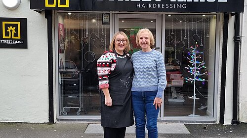 Susan Murray with employee outside of Street Image Hairdressing in Kirkintilloch.