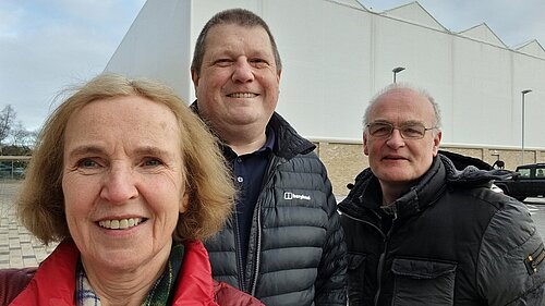 Susan Murray, candidate for Mid Dunbartonshire, with campaigner Ben and council group leader Vaughan outside the Allander Leisure Centre.